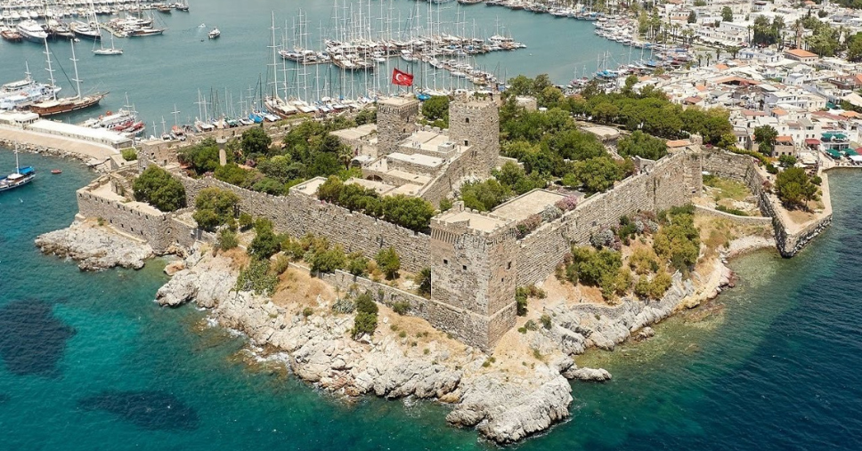 Aerial view of Bodrum Castle on the Aegean coast, a top landmark in Esimatic’s Bodrum travel recommendations.